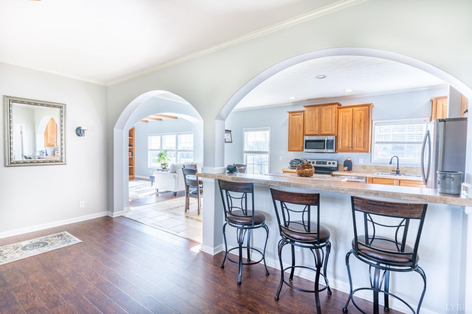 2659 Chilton Road Appomattox, VA 24522 - Photo 11 of 55 a view of a dining room with furniture and a large window
