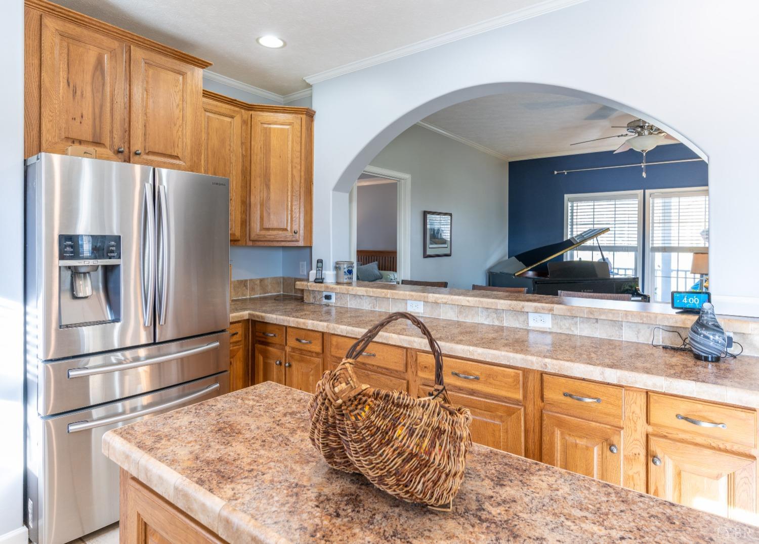 2659 Chilton Road Appomattox, VA 24522 - Photo 15 of 55 a kitchen with stainless steel appliances granite countertop a refrigerator sink and cabinets