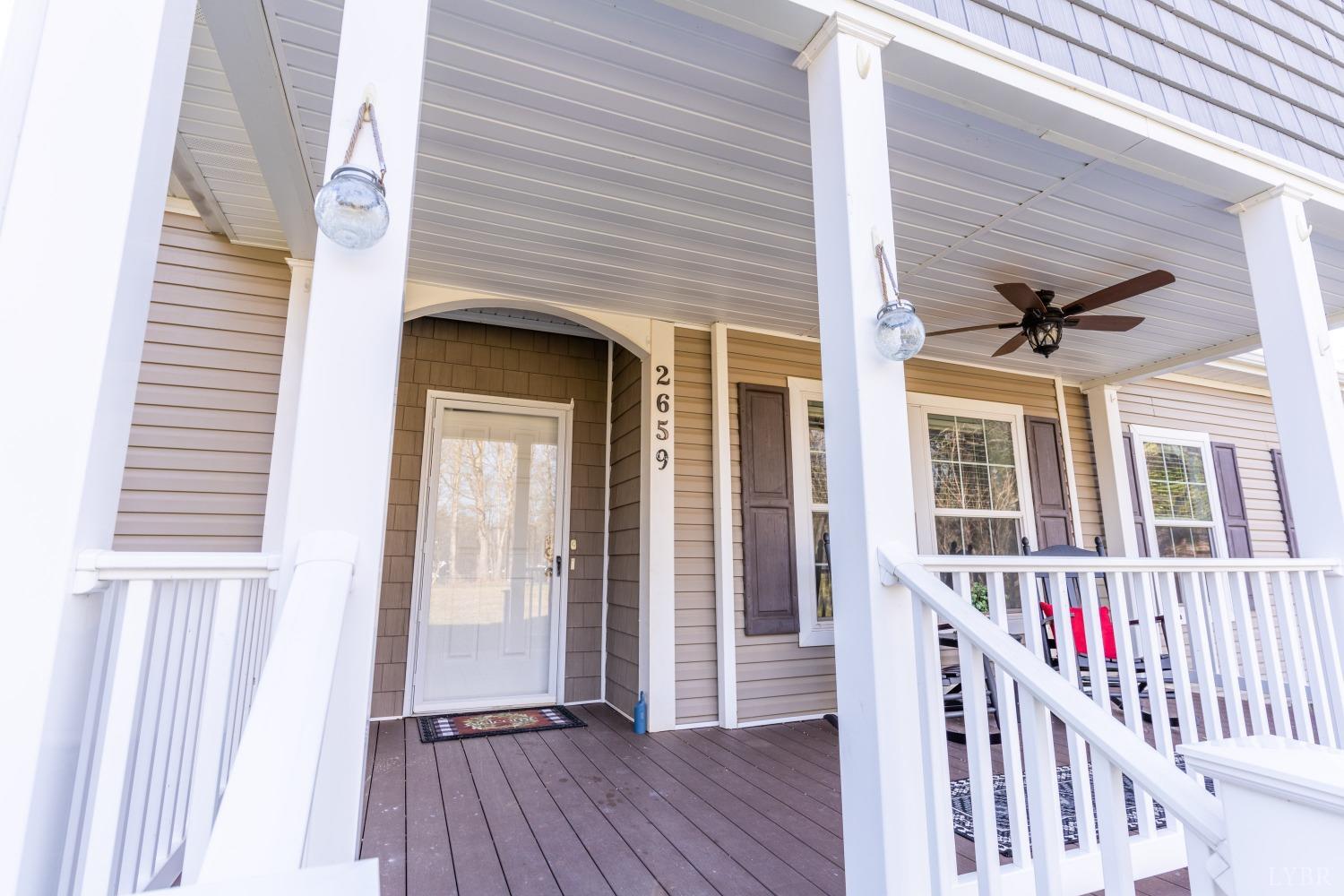 2659 Chilton Road Appomattox, VA 24522 - Photo 2 of 55 a view of a house with a porch