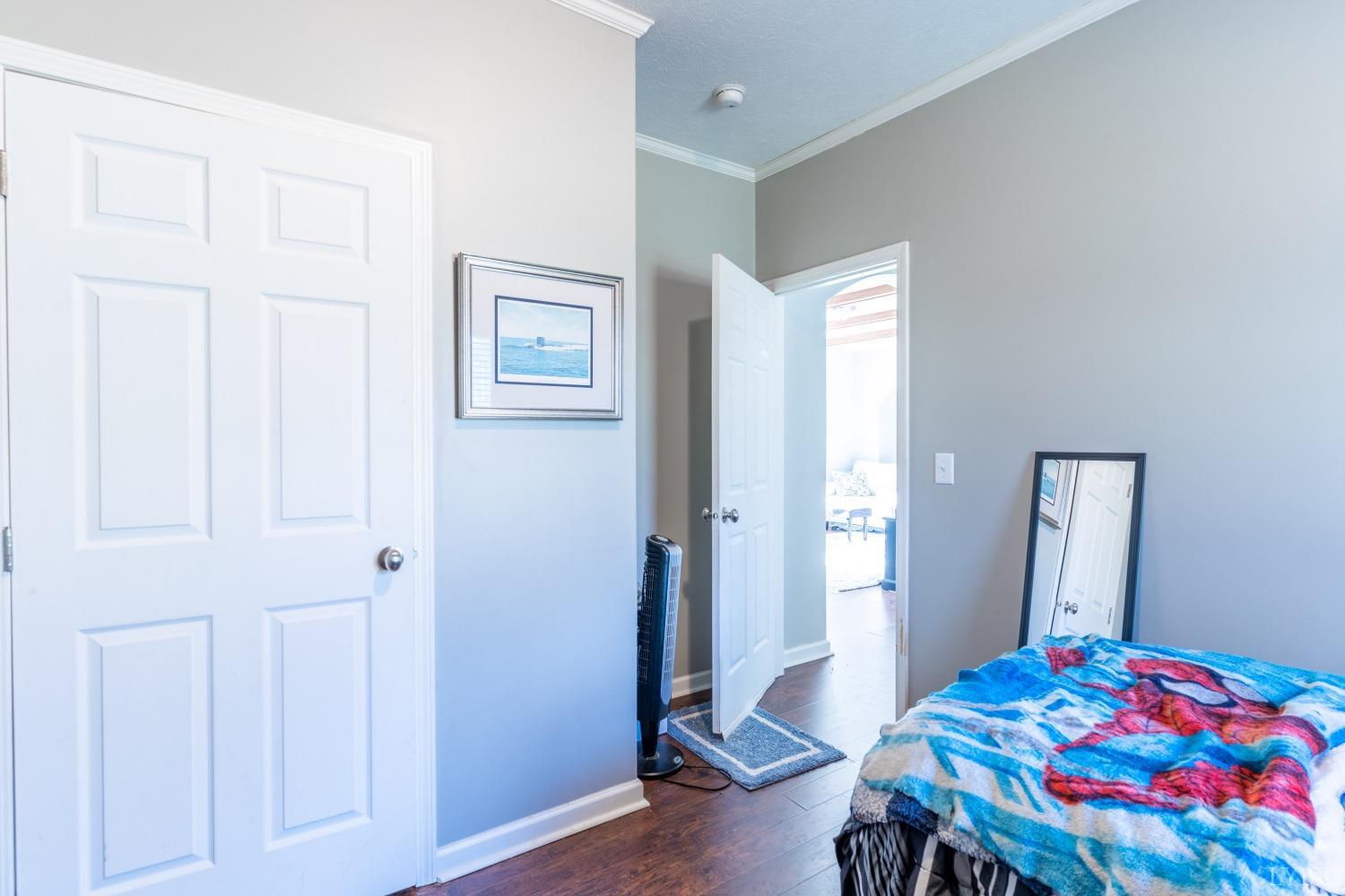 2659 Chilton Road Appomattox, VA 24522 - Photo 24 of 55 a bedroom with a bed and a table in it