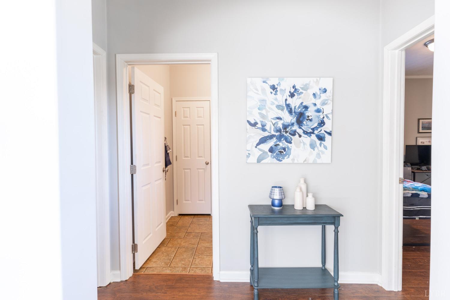 2659 Chilton Road Appomattox, VA 24522 - Photo 26 of 55 a view of a hallway with wooden floor and cabinet