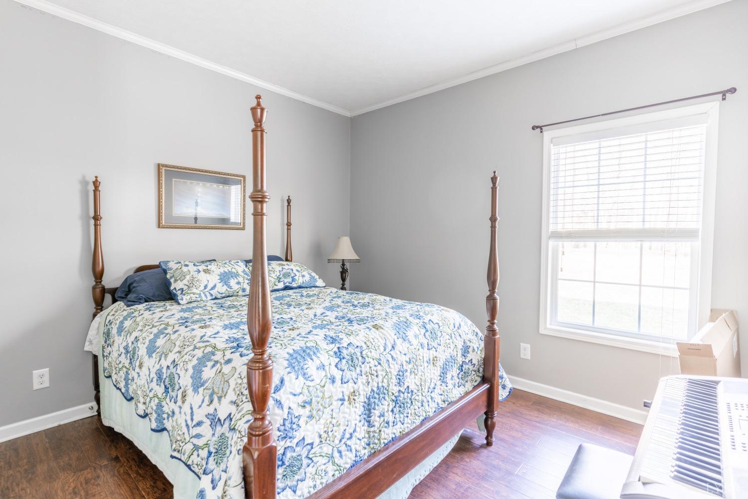 2659 Chilton Road Appomattox, VA 24522 - Photo 27 of 55 a bedroom with a bed and a window