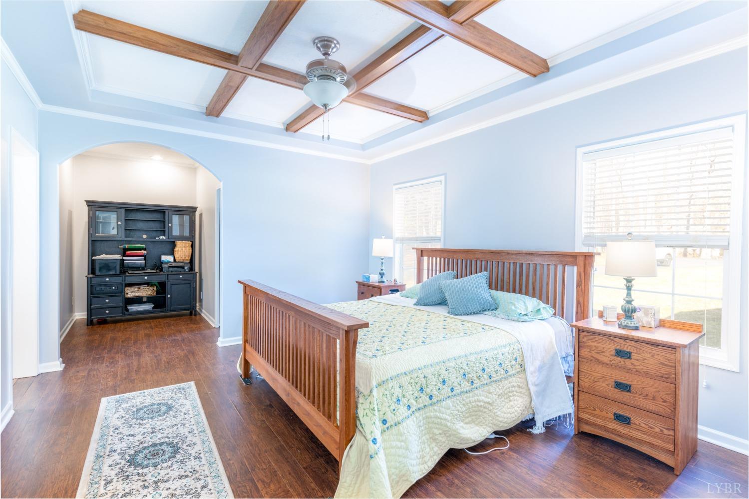 2659 Chilton Road Appomattox, VA 24522 - Photo 29 of 55 a bedroom with a bed and a mirror on the dresser