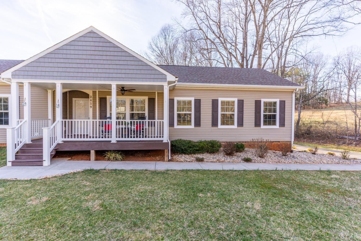 2659 Chilton Road Appomattox, VA 24522 - Photo 3 of 55 a front view of a house with garden