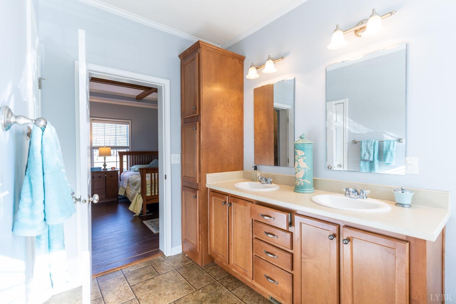 2659 Chilton Road Appomattox, VA 24522 - Photo 33 of 55 a bathroom with a sink double vanity and a mirror