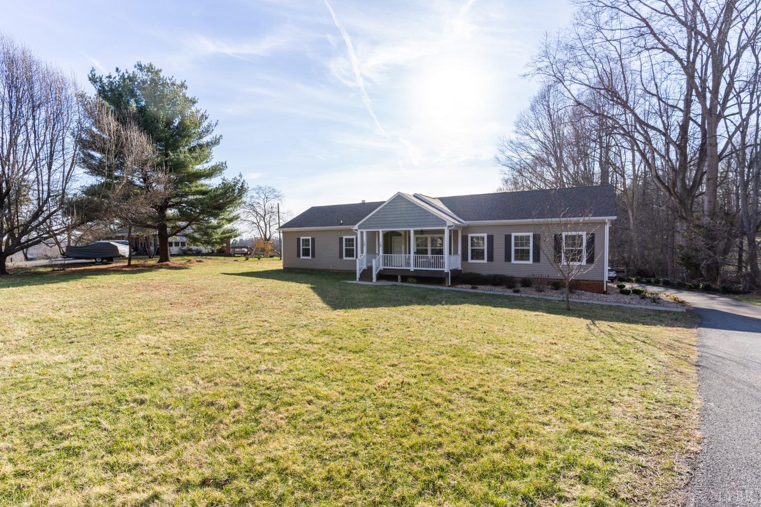 2659 Chilton Road Appomattox, VA 24522 - Photo 4 of 55 a front view of a house with swimming pool