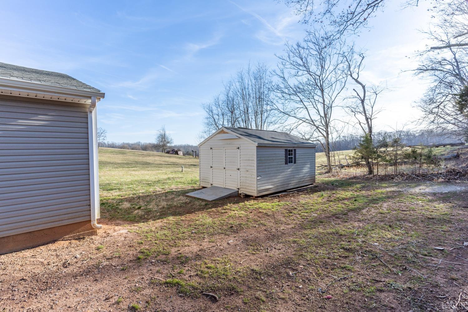 2659 Chilton Road Appomattox, VA 24522 - Photo 49 of 55 a view of a barn in the middle of a yard