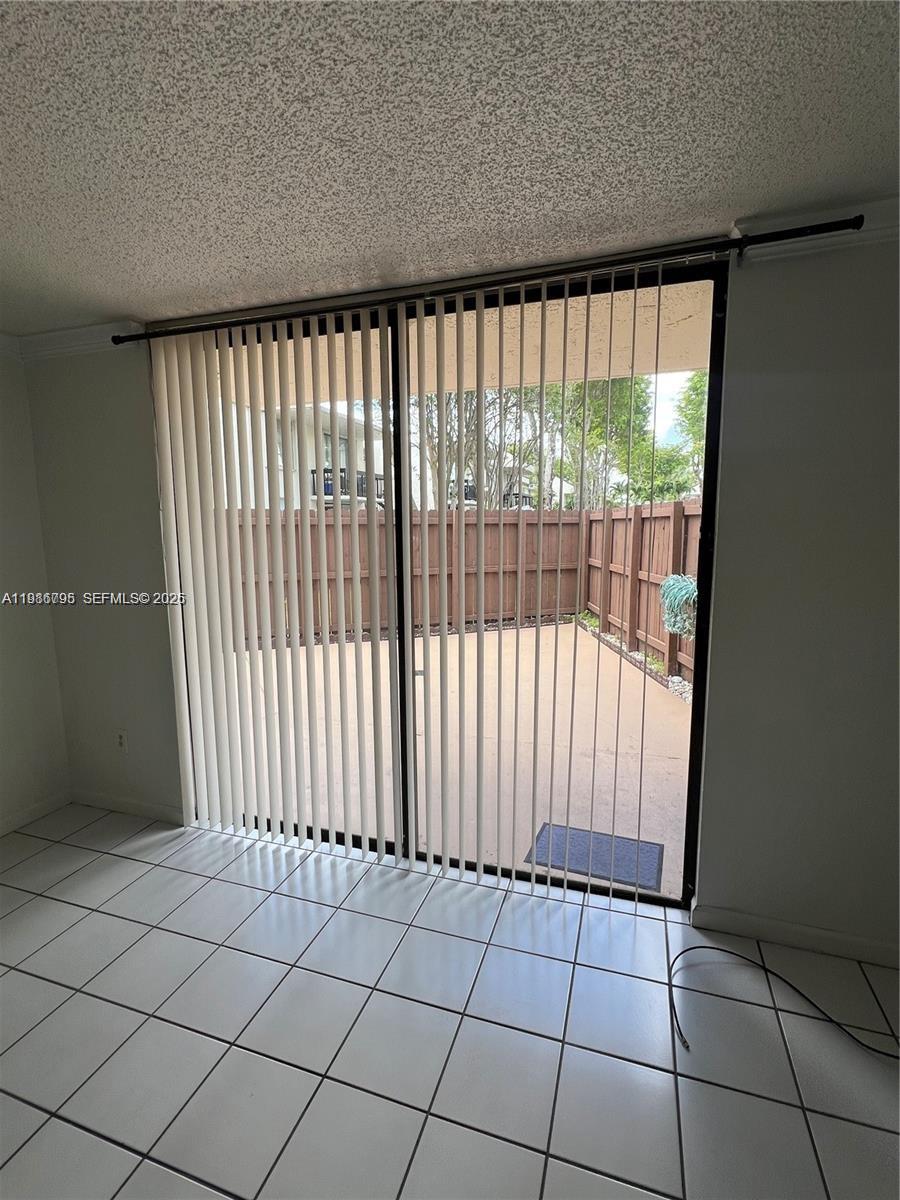 8307 Southwest 142nd Avenue, Unit F105 Miami, FL 33183 - Photo 6 of 19 a view of a black and white floor plan
