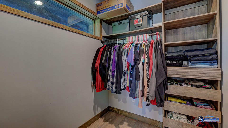 125 Hillcrest Drive Burlington, WI 53105 - Photo 21 of 52 a view of walk in closet with clothes and shoes