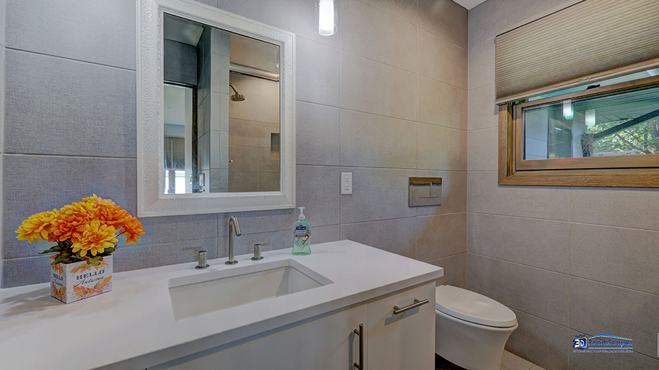 125 Hillcrest Drive Burlington, WI 53105 - Photo 24 of 52 a bathroom with a sink mirror vanity and toilet