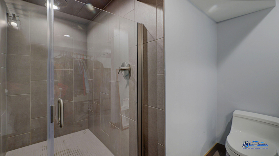 125 Hillcrest Drive Burlington, WI 53105 - Photo 31 of 52 a bathroom with a shower and a sink