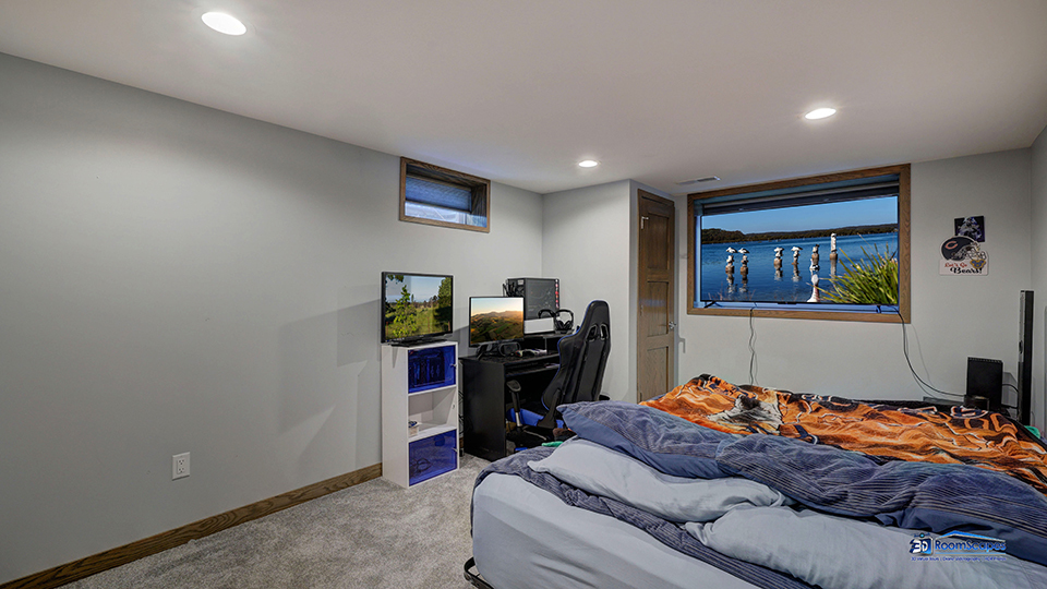 125 Hillcrest Drive Burlington, WI 53105 - Photo 34 of 52 a bedroom with a bed and furniture