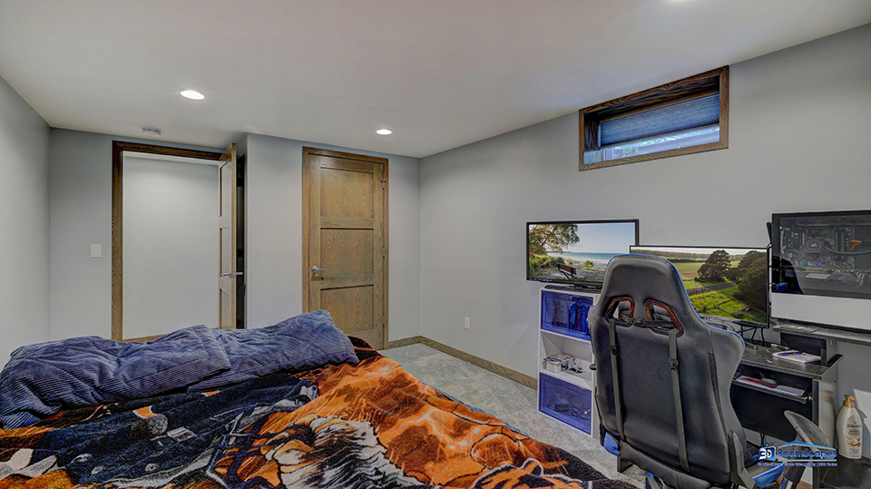 125 Hillcrest Drive Burlington, WI 53105 - Photo 35 of 52 a bedroom with bed and a tv