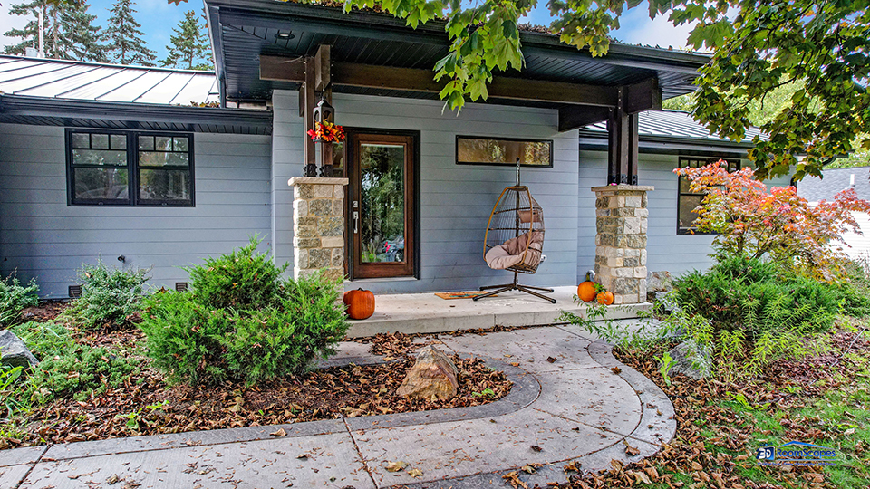 125 Hillcrest Drive Burlington, WI 53105 - Photo 40 of 52 a front view of a house with a yard