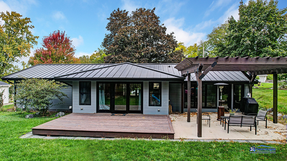 125 Hillcrest Drive Burlington, WI 53105 - Photo 41 of 52 a view of a house with a yard and sitting area