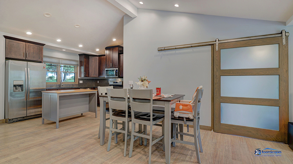 125 Hillcrest Drive Burlington, WI 53105 - Photo 8 of 52 a kitchen with a table and chairs in it