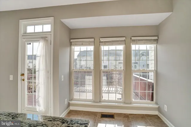a kitchen with a refrigerator sink and stove