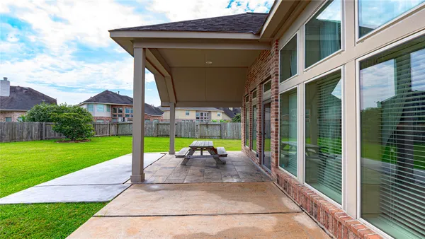 a view of a house with a big yard