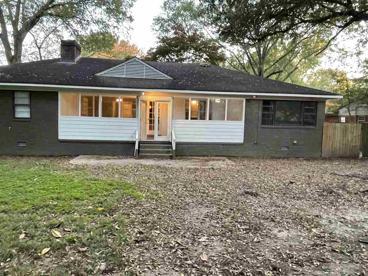 4294 Chickasaw Road Memphis, TN 38117 - Photo 5 of 15 a front view of a house with a yard