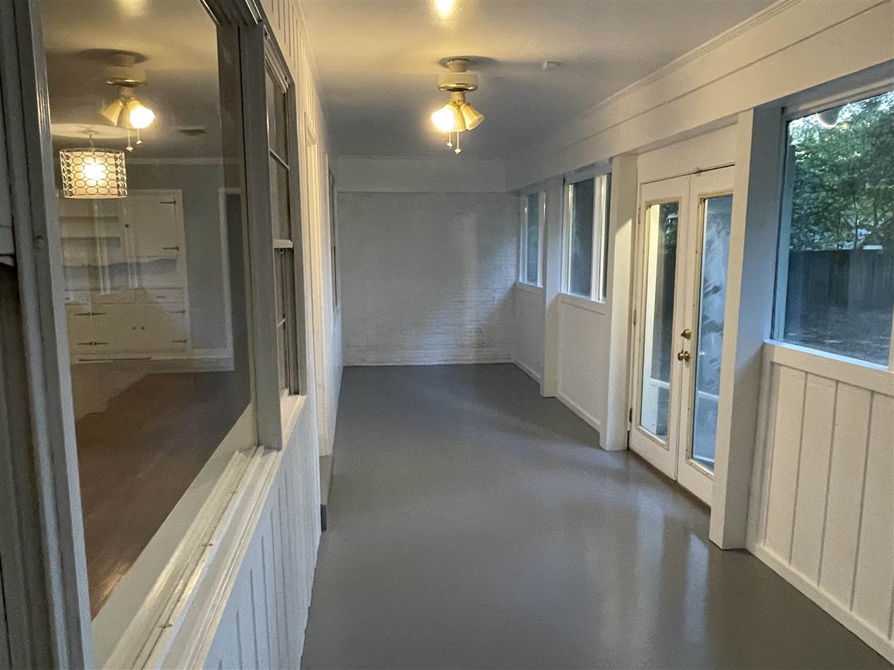 4294 Chickasaw Road Memphis, TN 38117 - Photo 9 of 15 a view of hallway with shower and wooden floor