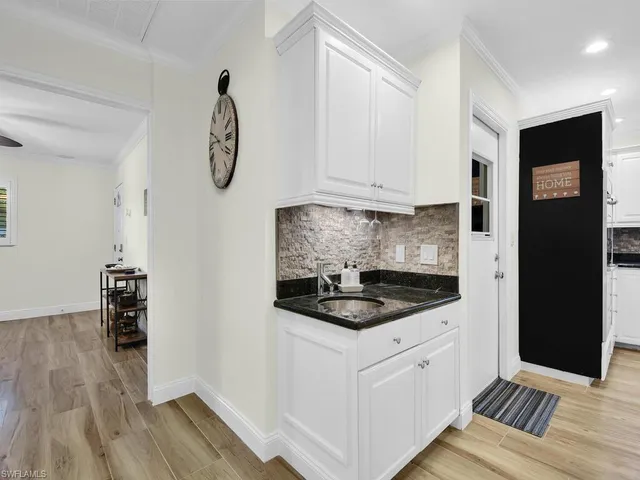 a view of a livingroom with furniture and window
