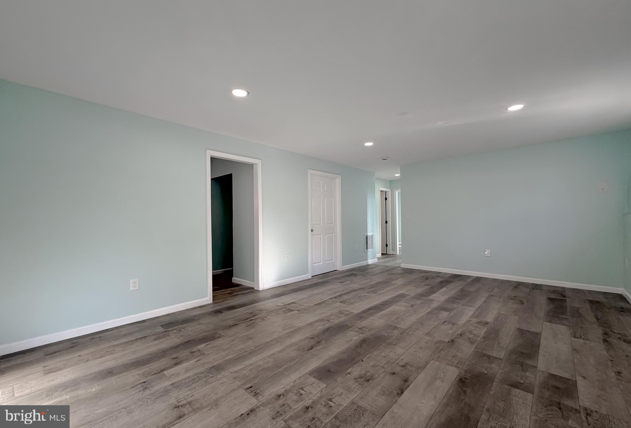 470 Sollers Wharf Road Lusby, MD 20657 - Photo 31 of 43 a view of an empty room with wooden floor and closet