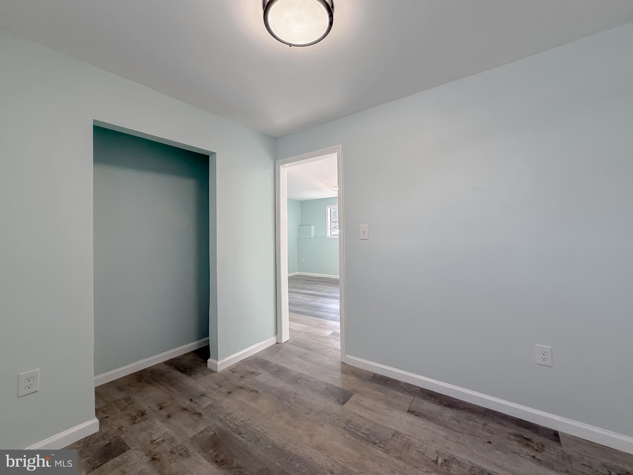 470 Sollers Wharf Road Lusby, MD 20657 - Photo 34 of 43 a view of an empty room with wooden floor