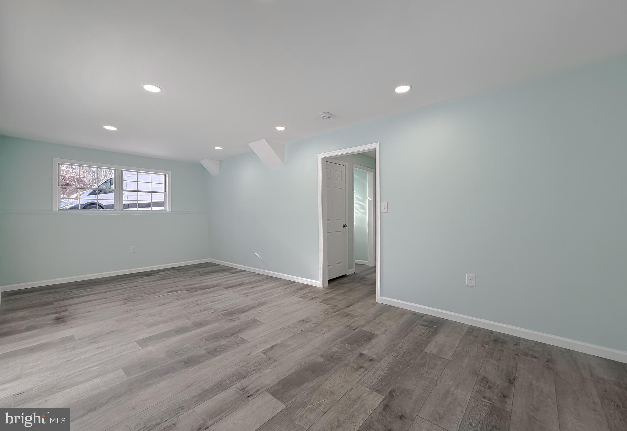 470 Sollers Wharf Road Lusby, MD 20657 - Photo 38 of 43 a view of an empty room and a window