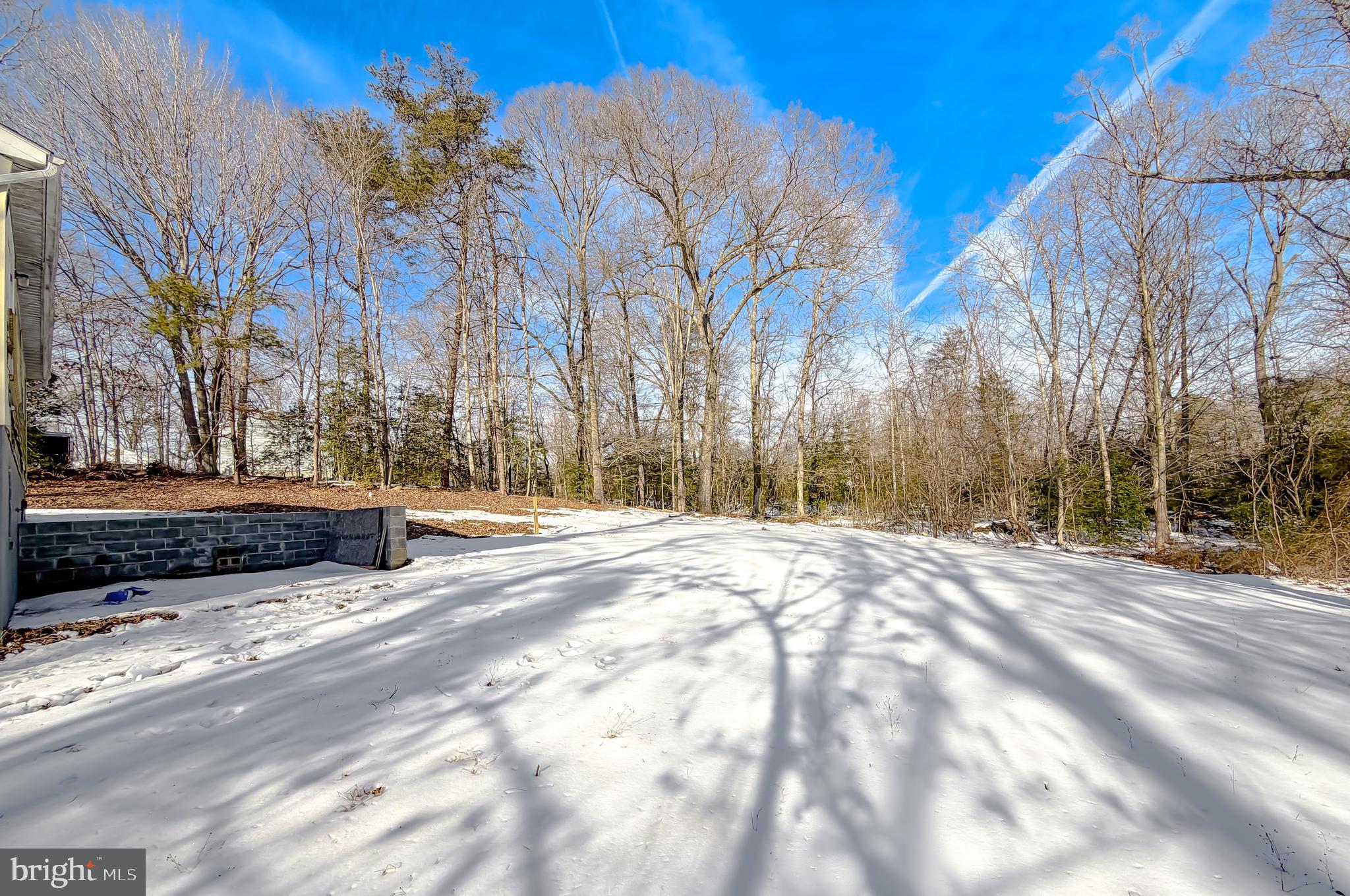 470 Sollers Wharf Road Lusby, MD 20657 - Photo 41 of 43 a view of road with snow on the roadside
