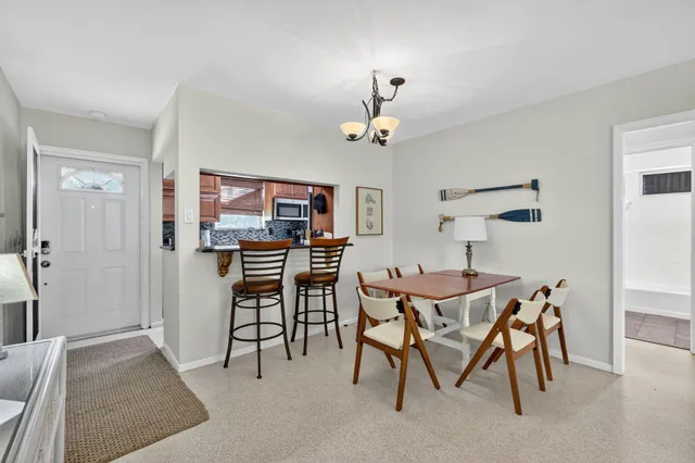 a view of a dining room with furniture