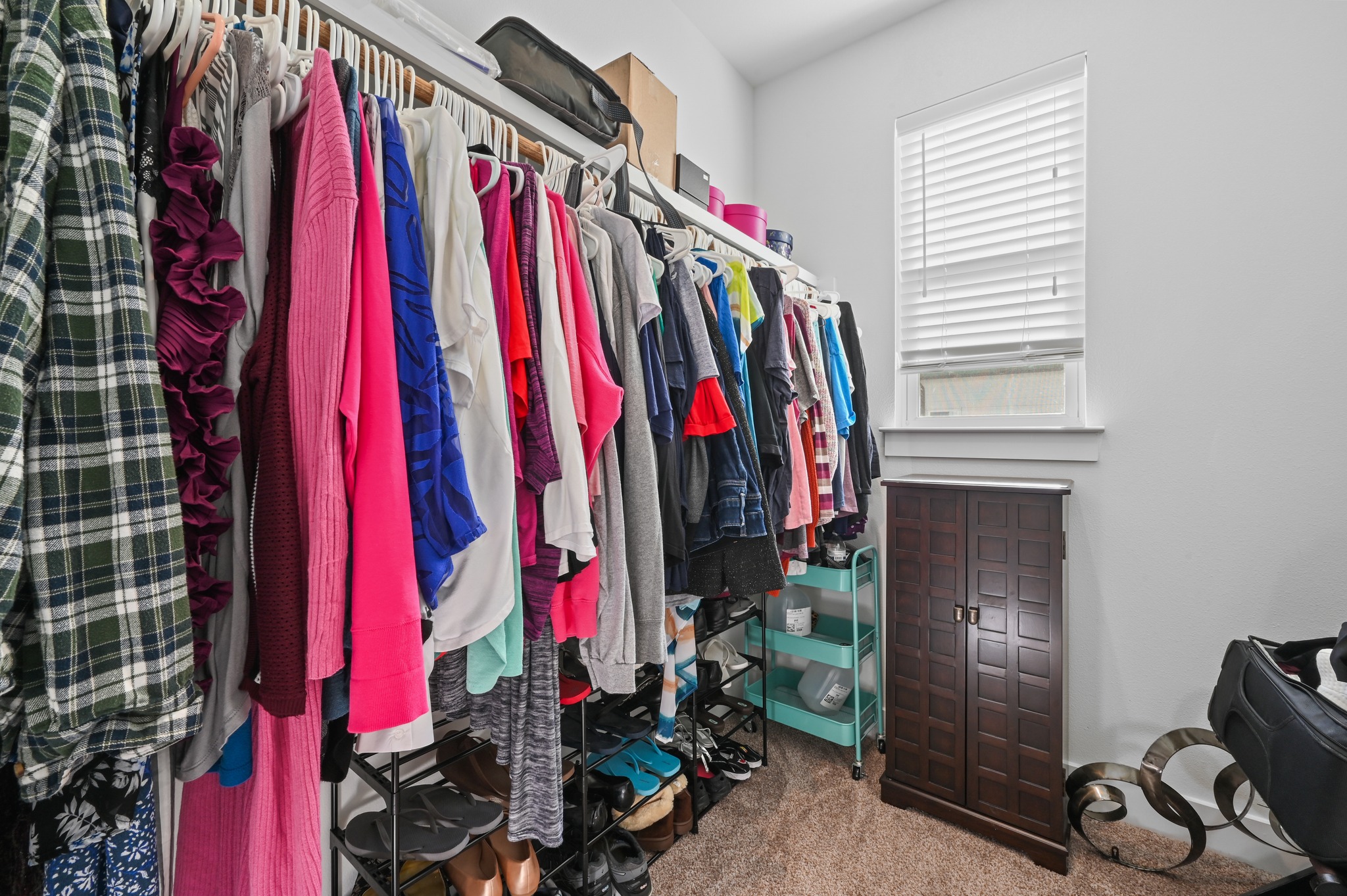 1405 Casey Street, Unit B Austin, TX 78704 - Photo 15 of 28 Walk in closet with light colored carpet