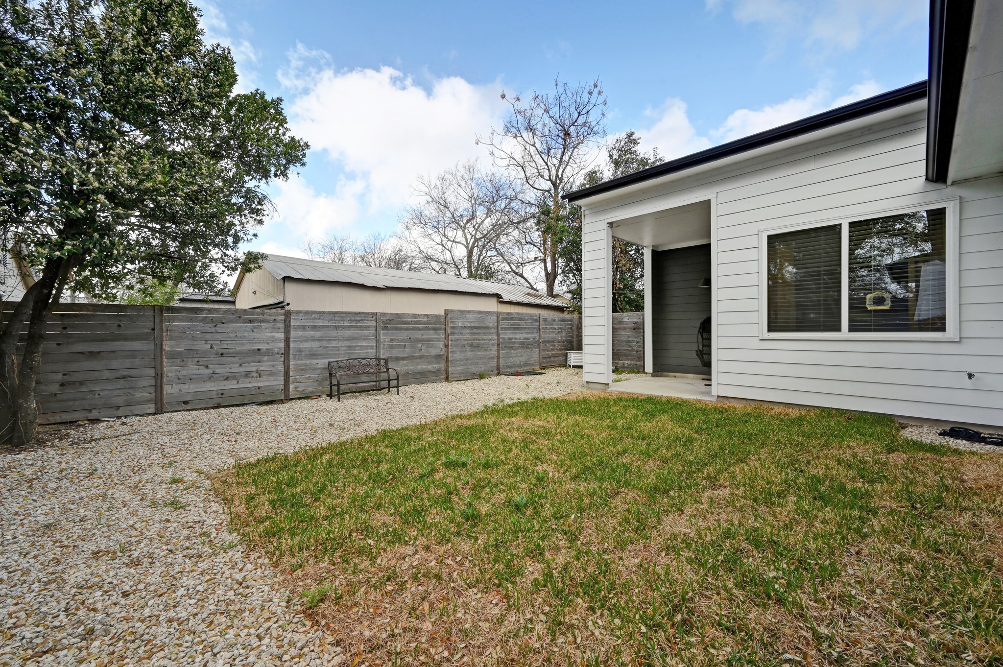 1405 Casey Street, Unit B Austin, TX 78704 - Photo 21 of 28 Fenced backyard featuring a patio area