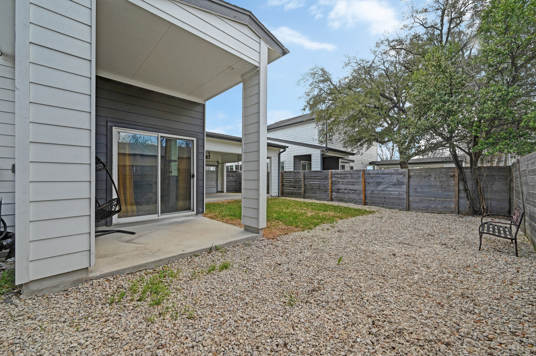 1405 Casey Street, Unit B Austin, TX 78704 - Photo 23 of 28 Fenced backyard featuring a patio area
