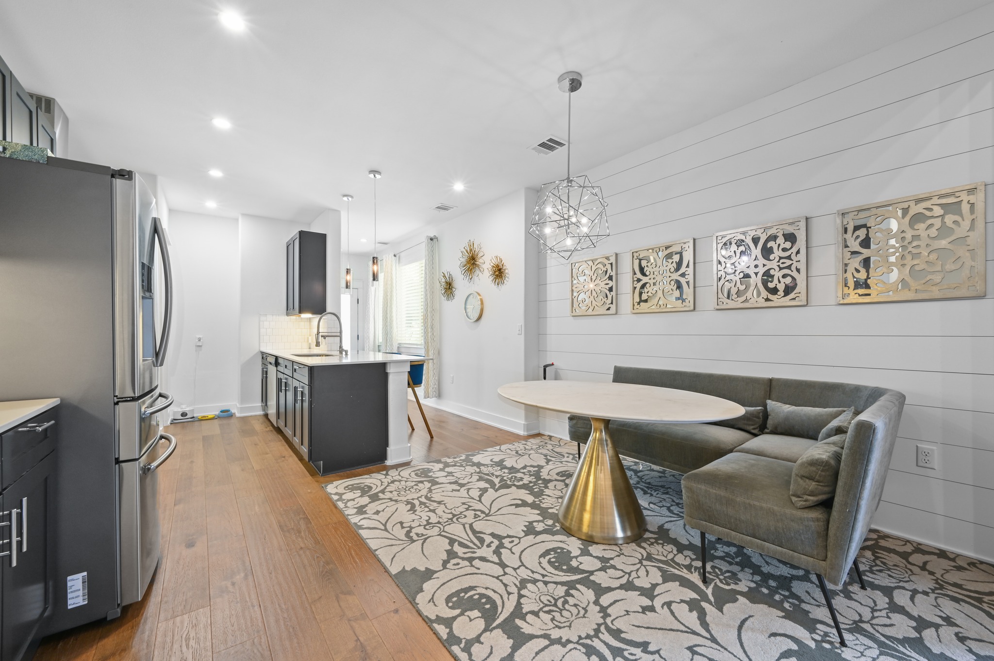 1405 Casey Street, Unit B Austin, TX 78704 - Photo 5 of 28 Dining space featuring light wood finished floors and suspended lighting