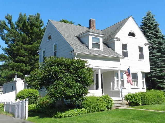200 High Ridge Avenue Ridgefield, CT 06877 - Photo 1 of 1 a front view of a house with a yard
