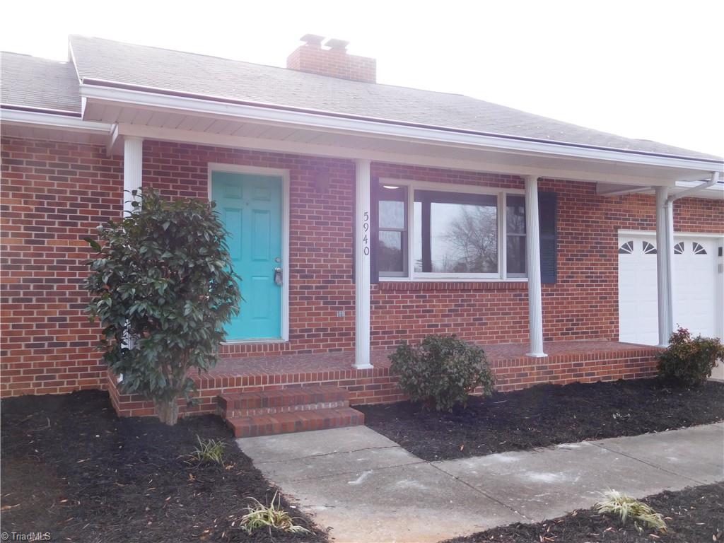 5940 Skylark Road Pfafftown, NC 27040 - Photo 2 of 42 All Brick Ranch w/double car attached main level garage.