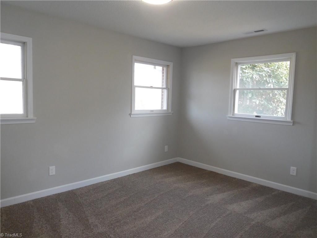 5940 Skylark Road Pfafftown, NC 27040 - Photo 15 of 42 2nd Bedroom. All New Carpet in BR's. Both Bedrooms are very large.