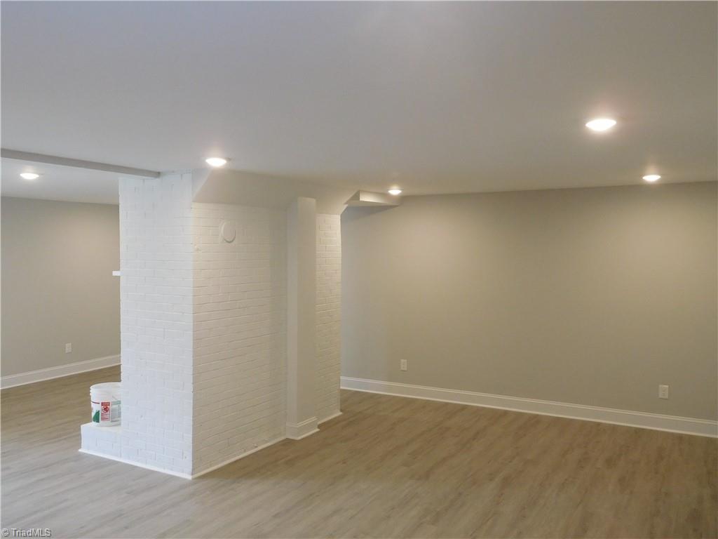5940 Skylark Road Pfafftown, NC 27040 - Photo 18 of 42 Fully Finished Basement. New Flooring and fixtures throughout this home. TONS OF SPACE!