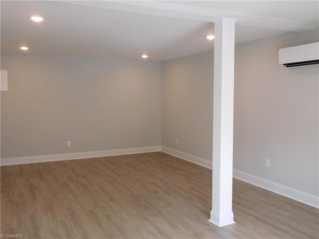 5940 Skylark Road Pfafftown, NC 27040 - Photo 25 of 42 Large Room w/own mini-split in basement. Could be used as large Office or 3rd BR.