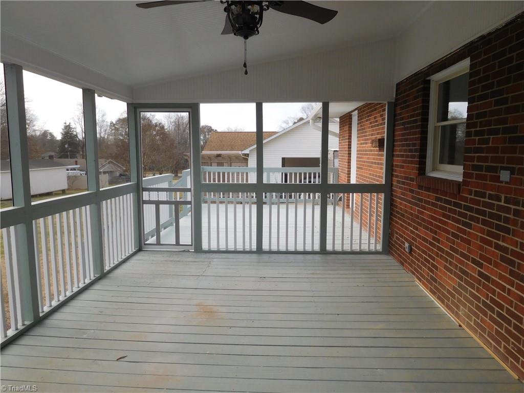 5940 Skylark Road Pfafftown, NC 27040 - Photo 31 of 42 Porch is located off DR. Perfect for entertaining. Leads to Deck. Deck is perfect for Grilling on.