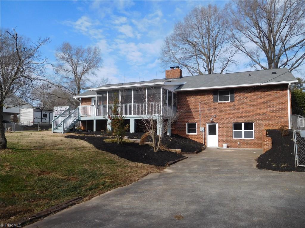 5940 Skylark Road Pfafftown, NC 27040 - Photo 32 of 42 More parking available around back. Yard/Lot is partially fenced.