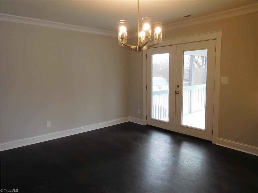 5940 Skylark Road Pfafftown, NC 27040 - Photo 7 of 42 Dining Room. DR leads out to large Screened porch.
