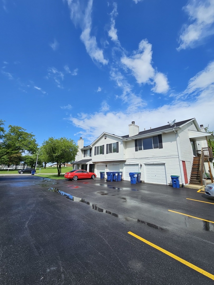 61 Red Barn Road, Unit 1 Matteson, IL 60443 - Photo 13 of 13 a view of road with card parked on side of road