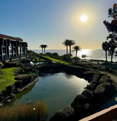 a view of a lake from a yard