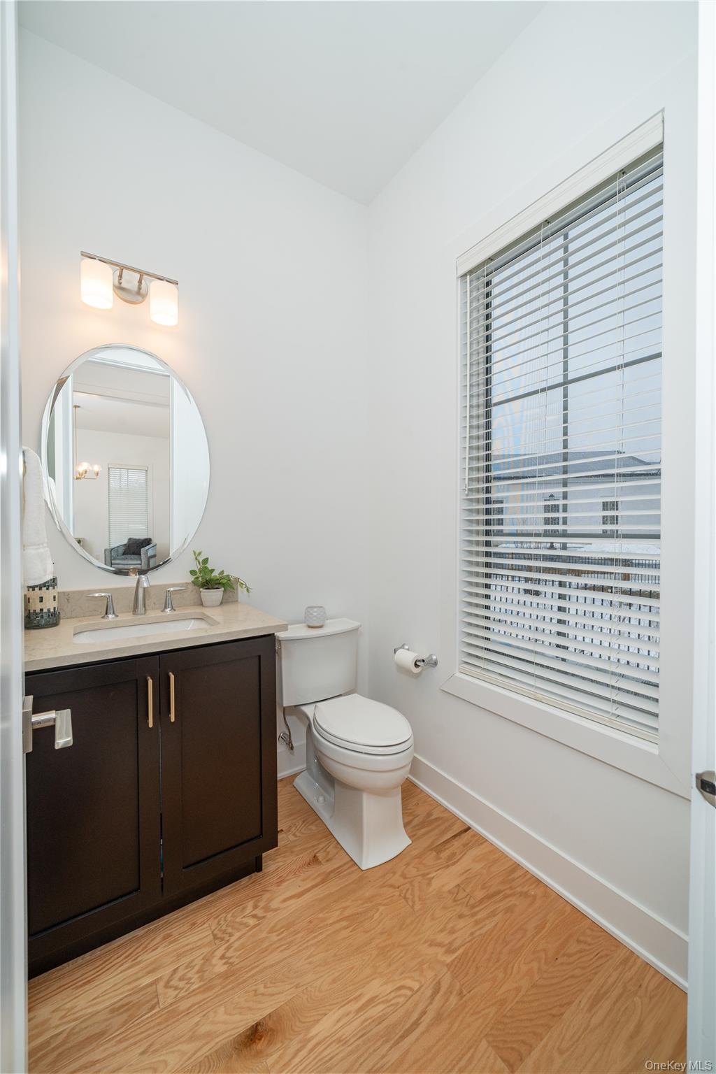 4 Wright Drive Chappaqua, NY 10514 - Photo 12 of 35 The powder room is conveniently located on the main level by the entry foyer, perfect for guests.