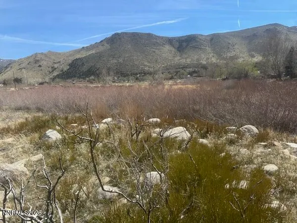 a view of lake with mountain