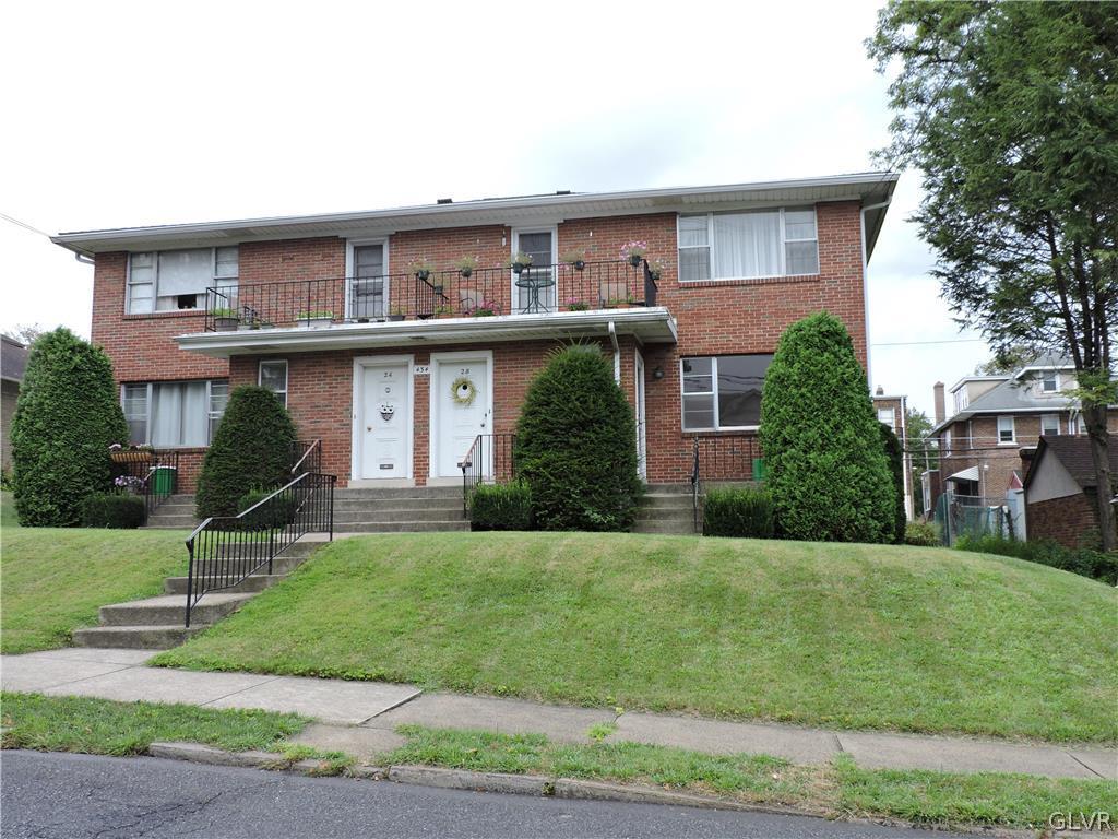 434 North Leh Street, Unit 1B Allentown, PA 18104 - Photo 1 of 7 a front view of a house with a yard