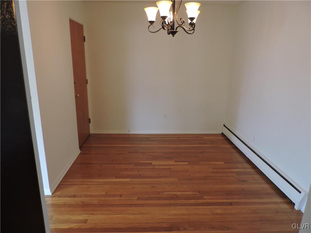 434 North Leh Street, Unit 1B Allentown, PA 18104 - Photo 4 of 7 a view of a hallway with wooden floor