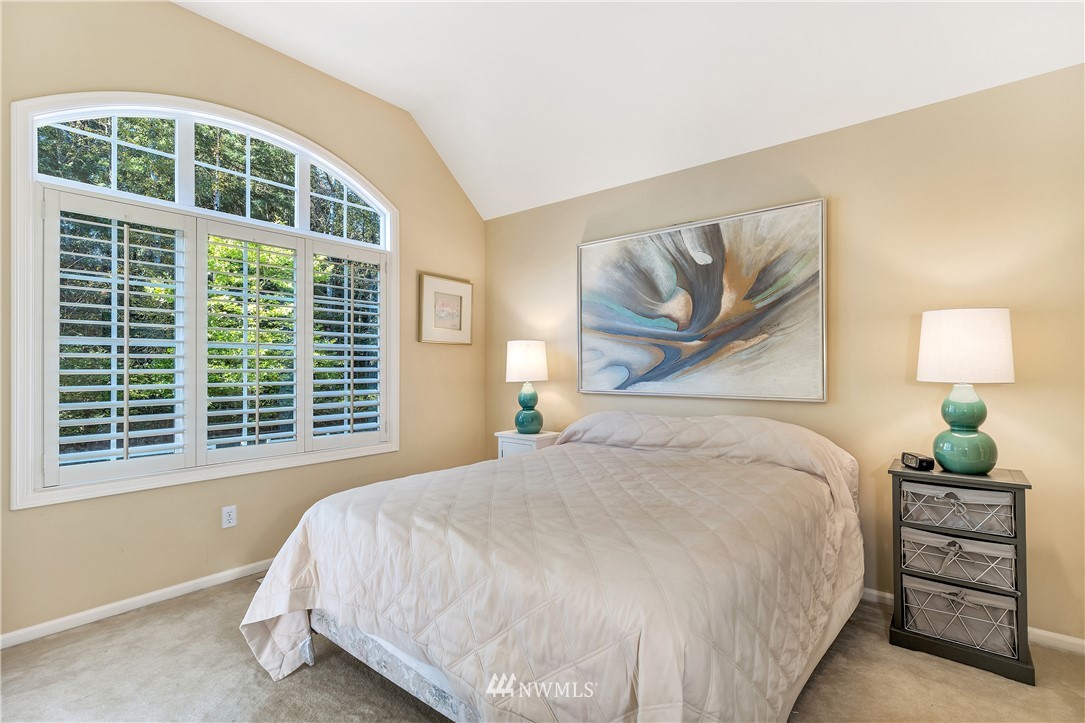 4916 177th Place Southeast Bothell, WA 98012 - Photo 18 of 25 a bedroom with a bed and window