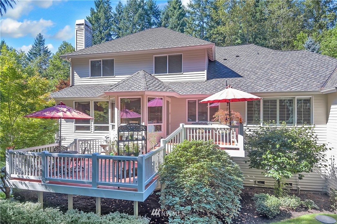 4916 177th Place Southeast Bothell, WA 98012 - Photo 22 of 25 a front view of a house with garden